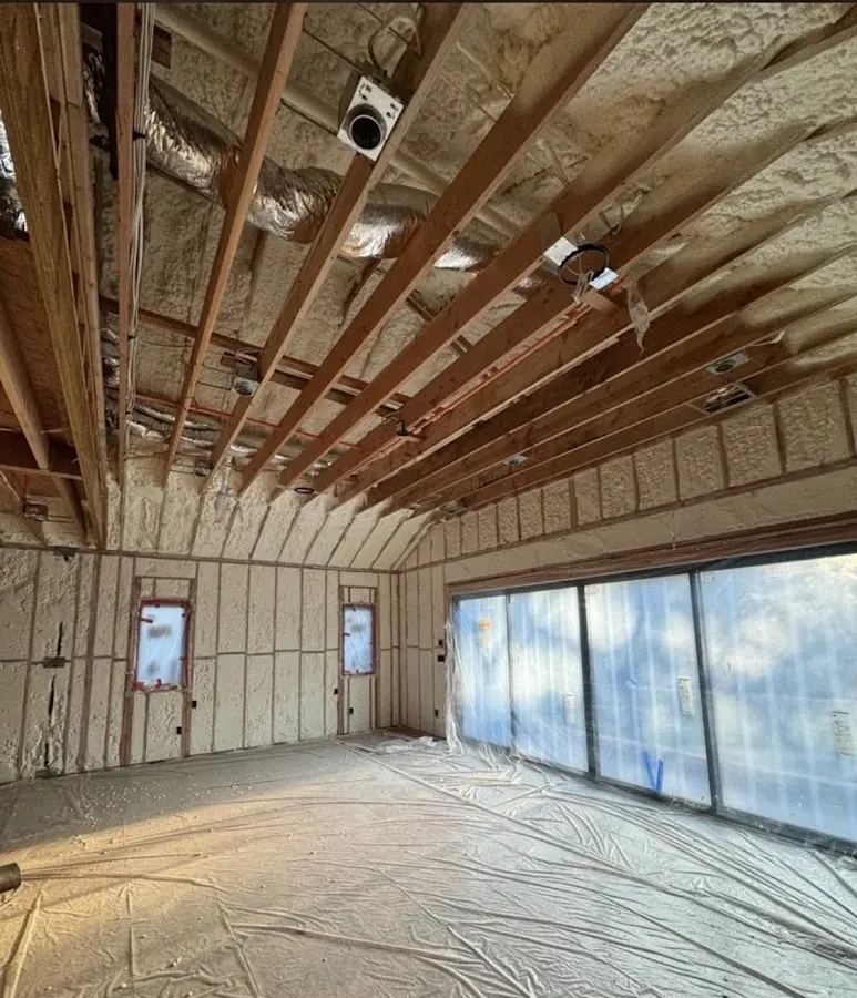 Interior walls and ceiling insulated with spray foam during new construction in Collingdale